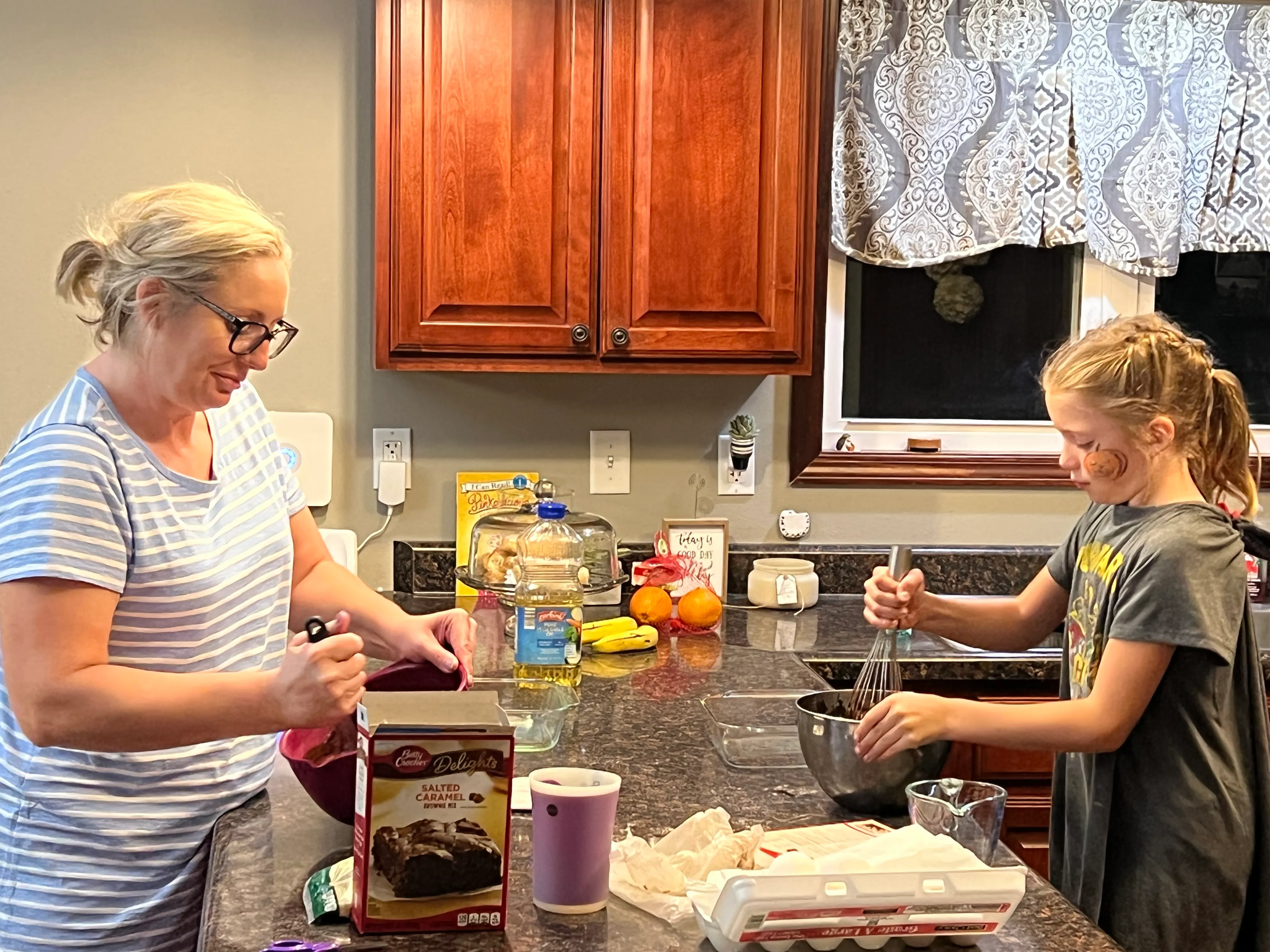 Mixing and baking together in the kitchen